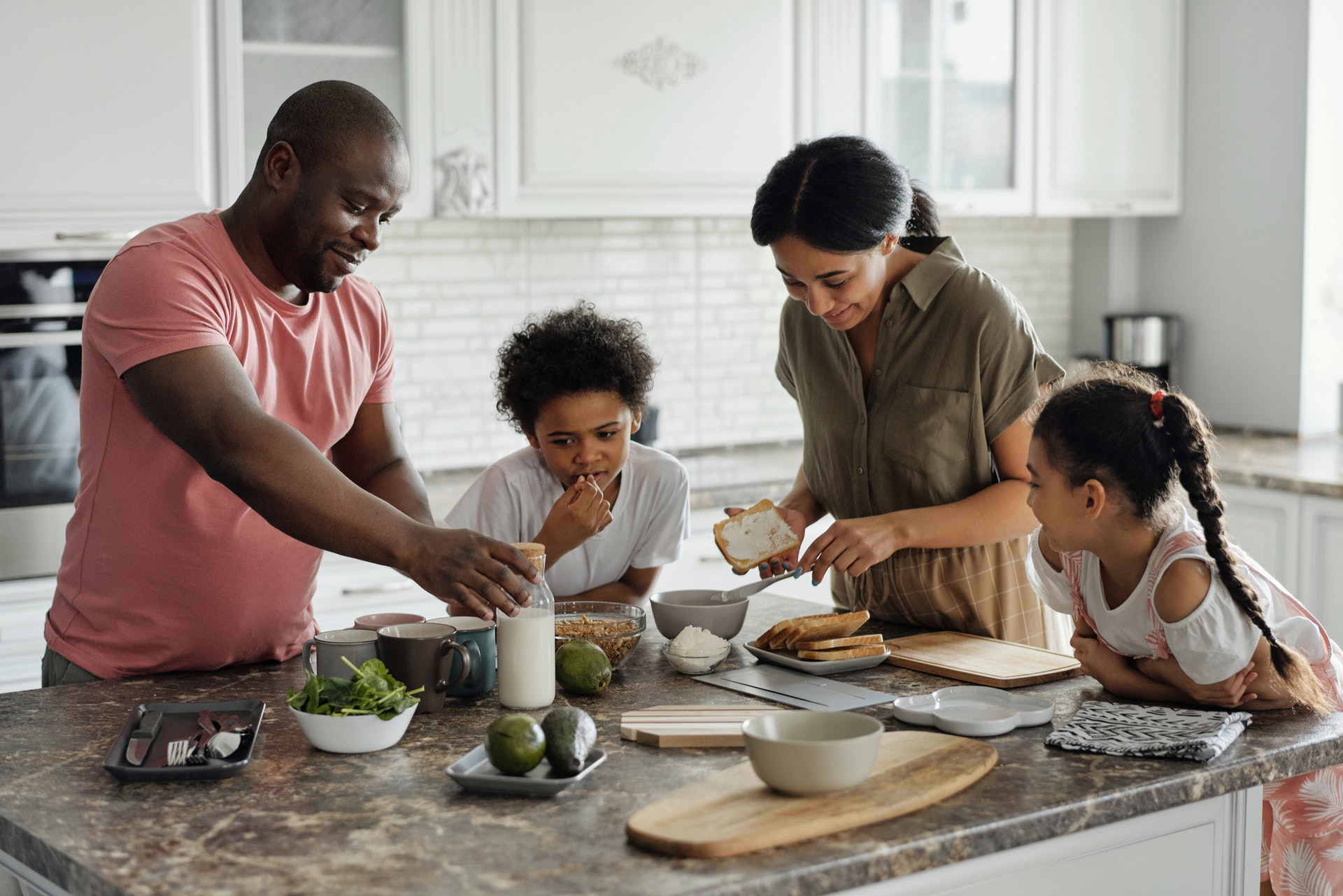 family making lunch