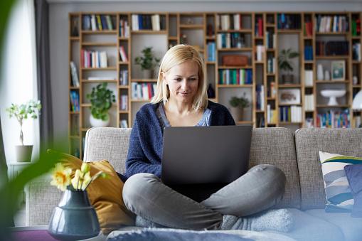 woman working on computer at home
