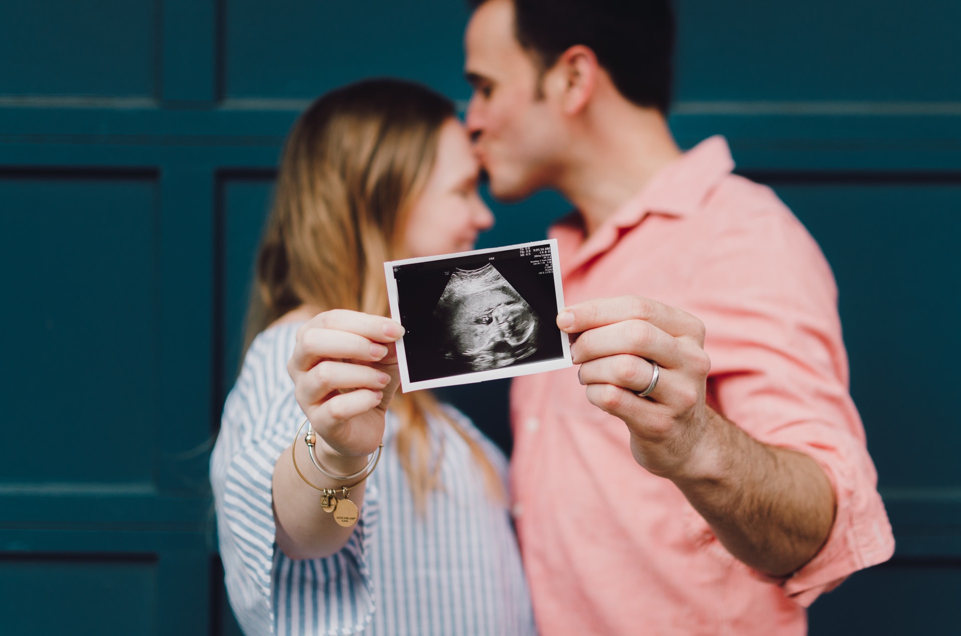 couple holding ultrasound